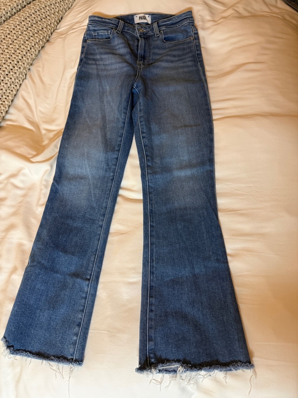PAIGE Medium Wash Flare Jeans with Frayed Hem